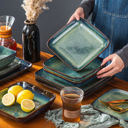 The Vancasso Stern 16-Piece Green Square Stoneware Dinnerware Set features a unique reactive glaze, providing service for four