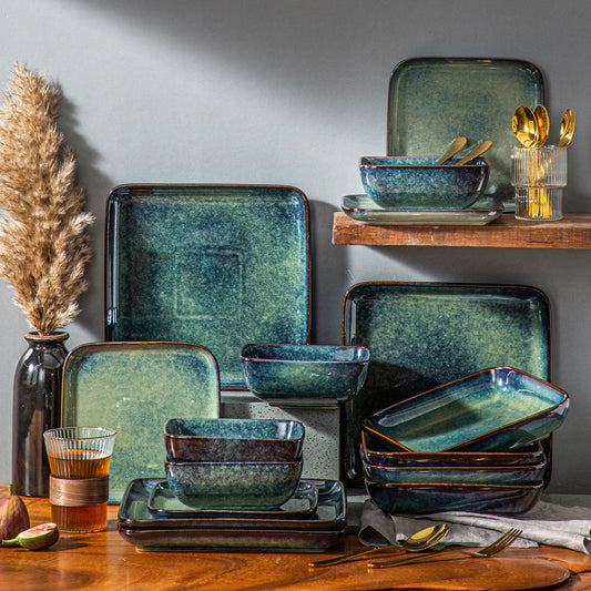 The Vancasso Stern 16-Piece Green Square Stoneware Dinnerware Set features a unique reactive glaze, providing service for four